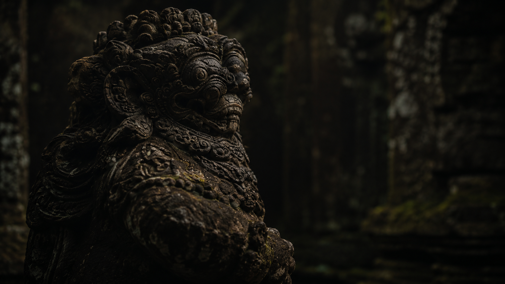 Ancient stone guardian in shadow